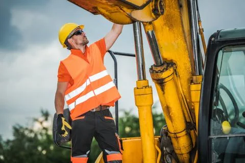 Modern Excavator Operator.  Foto stock