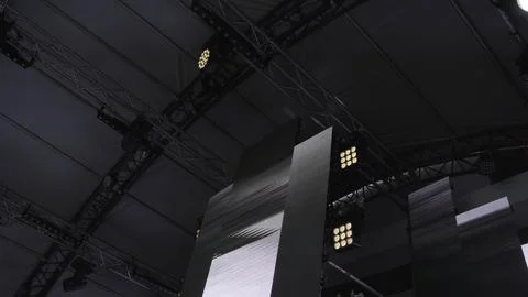 A Modern Exhibition Space Featuring an Array of Geometric Design Elements and Stock Photos