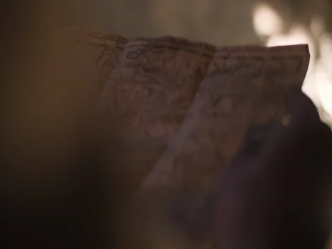 Modern Explorer Holds Treasure Map Stock Footage 77196747