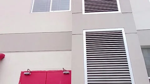 Modern exterior architecture with an emergency exit door view Stock Footage 343933475