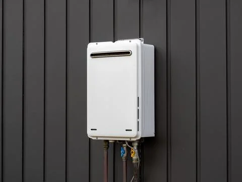Modern external continuous flow gas water heater Stock Photos