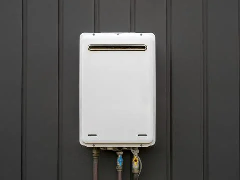 Modern external continuous flow gas water heater Stock Photos