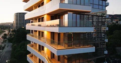 Modern facade building LED illumination light aerial view slide evening city Stock Footage 301875788