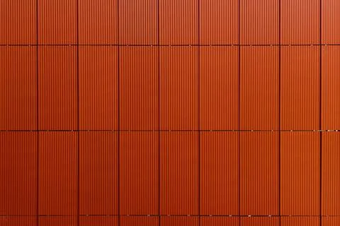 Modern facade of extruded ceramic panels. Ventilated facade Stock Photos