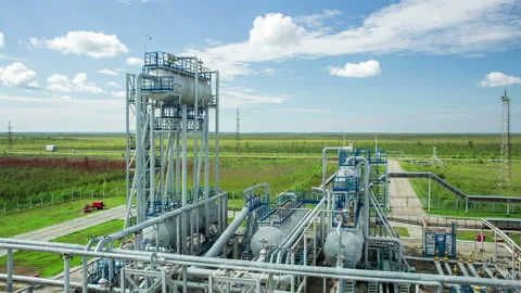 Modern facility with pipes or powerful process area at the biofuel depot or tank Stock Footage 199487825