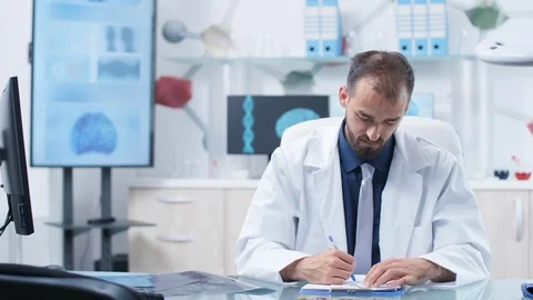 In modern facility scientist in white robe is having a conversation with a Stock Footage 109173380