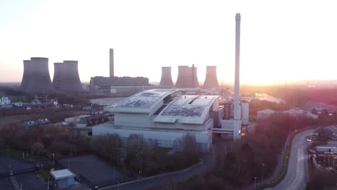 Modern factory solar panel rooftop and fossil fuel power station at Stock Footage 171272144
