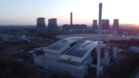Modern factory solar panel rooftop and fossil fuel power station at Stock Footage 171272163