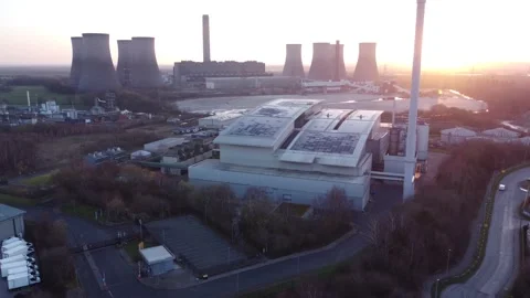 Modern factory solar panel rooftop and fossil fuel power station at Stock Footage 171272260
