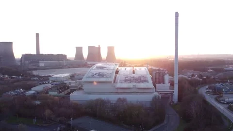 Modern factory solar panel rooftop and fossil fuel power station at Stock Footage 171272270