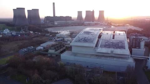 Modern factory solar panel rooftop and fossil fuel power station at Stock Footage 171272285