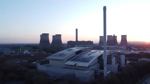 Modern factory solar panel rooftop and fossil fuel power station at Stock Footage 171272375
