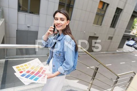 Modern fashion designer working outdoors Stock Photos