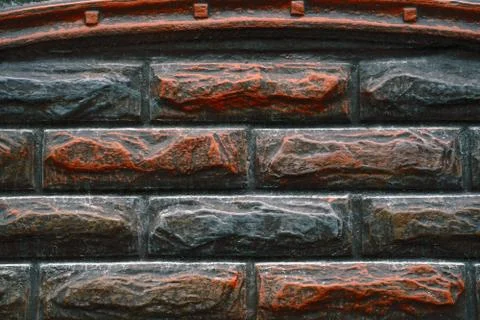 Modern fence with the effect of aged bricks Stock Photos