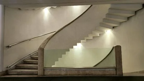 Modern Floating Staircase with Mirror Reflection Stock Photos