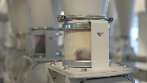 Modern flour mill. Close up of wheat milling moving through the pipes. Stock-Footage 277952408
