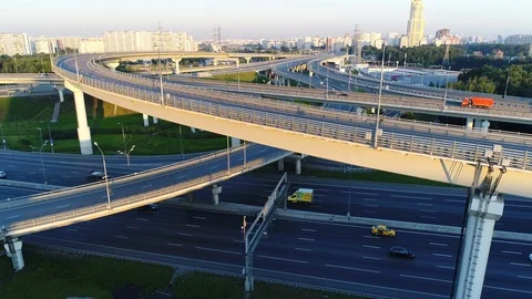 A modern flyover road junction in a large megapolis Stock Footage 120599849