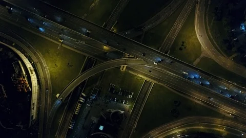 A modern flyover road junction in a large megapolis Stock Footage 120857571