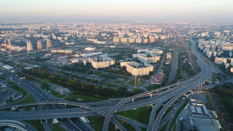 A modern flyover road junction in a large megapolis Stock Footage 120857938