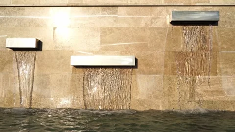 Modern fountain in the form of rectangular panels on a marble wall Stock Footage 267415574