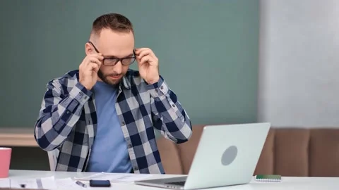 Modern freelancer guy start working remotely use laptop at home office. Medium Stock Footage 145021591