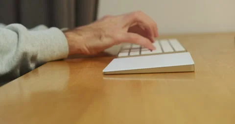 Modern freelancer working at stylish wireless keyboard and trackpad, desktop Stock-Footage 292120982