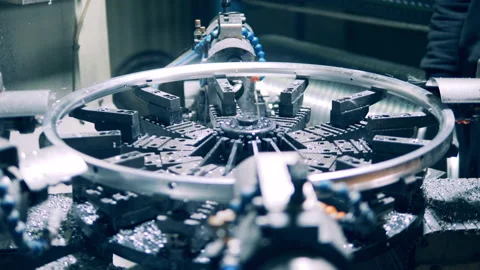 Modern functioning bicycle rim punching machine at a factory Stock Footage 148485286