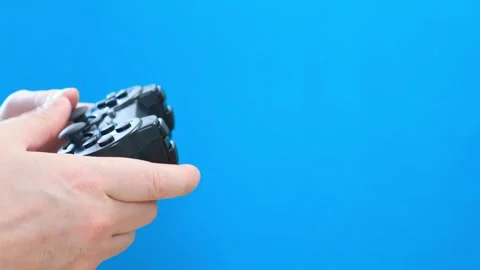 Modern game controller isolated on white blue background Video stock 255290444