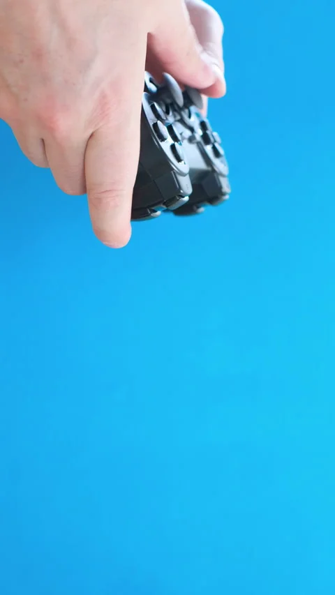 Modern game controller isolated on white blue background. Vertical video Video stock 255855009