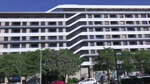 Modern geometric apartment building facade in Madrid Stock-Footage 335484912