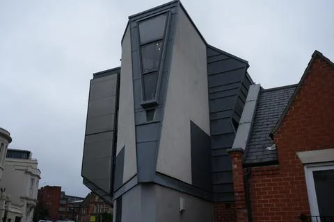 Modern Geometric Building Architecture In Nottingham, England Under Cloudy Sky. Stock Photos