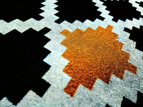Modern geometric carpet texture Stock Photos