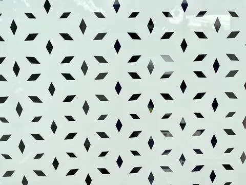 Modern Geometric Star Seamless Pattern Cutout Design on Frosted Glass Window Stock Photos
