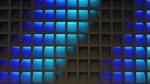 A modern geometric wall pattern illuminated with blue and cyan gradient lighting Stock Footage 339284208