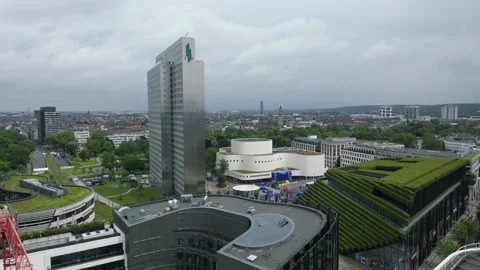 Modern German urban development featuring the iconic Dreischeibenhaus Stock Footage 336704794
