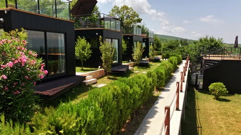 Modern Glamping Cabins Stone Wall Green Hillside Georgia Stock Footage 306309980