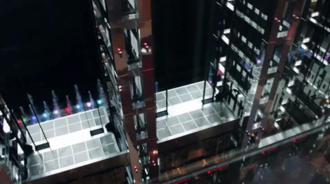 Modern glass and metal elevators rise in an airport. Stock Footage 39790128