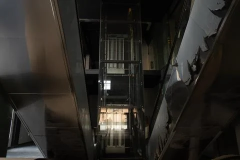 Modern glass elevator shaft inside contemporary building architecture with .. 스톡 사진
