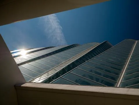 Modern glass office building with dramatic low angle view Stock Photos
