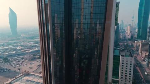 Modern Glass Reflection – 4K Drone Shot of Urban Kuwait Towers Stock-Footage 309864265