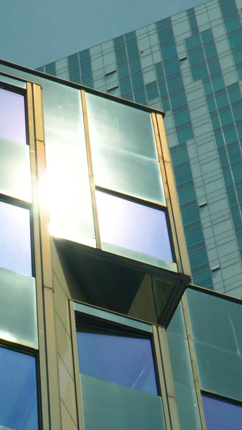 Modern Glass Skyscraper Facade Reflection During Golden Hour In Warsaw Video stock 340329762