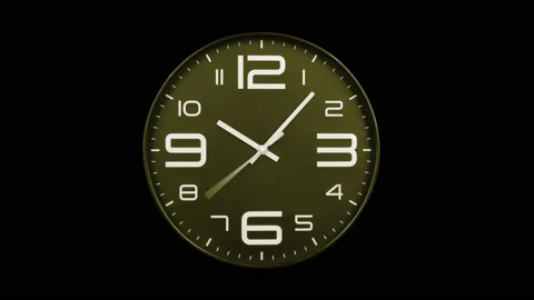 Modern golden clock face moving fast forward time lapse Stock Footage 127372988