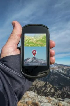 Modern GPS navigation device in the mountains Stock Photos