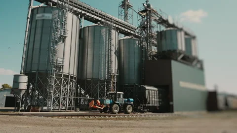 Modern Grain Elevator and Storage Silos at Agricultural Facility. Stock Footage 346798114