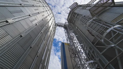 Modern grain elevators. Industrial grain storage tanks. Agribusiness. Stock Footage 150900639