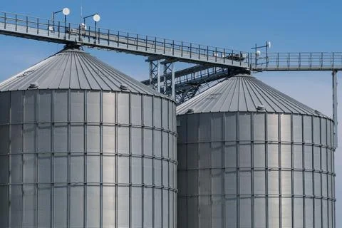 Modern grain silo. Grain elevators. Stock Photos