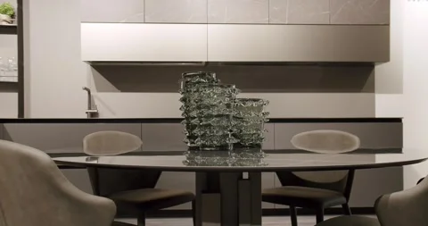 Modern gray and white kitchen furniture with marble table. Comfortable Home Stock Footage 307409078