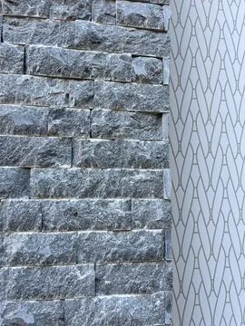 Modern Gray Stone Wall Texture with Geometric Pattern Background Foto stock