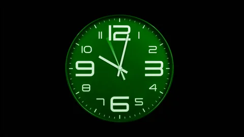 Modern green clock face moving fast forward time lapse Stock Footage 127387455