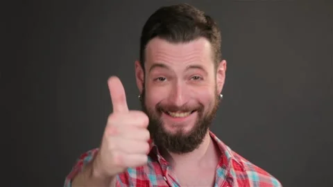 Modern guy shows thumb up 스톡 동영상 251462987